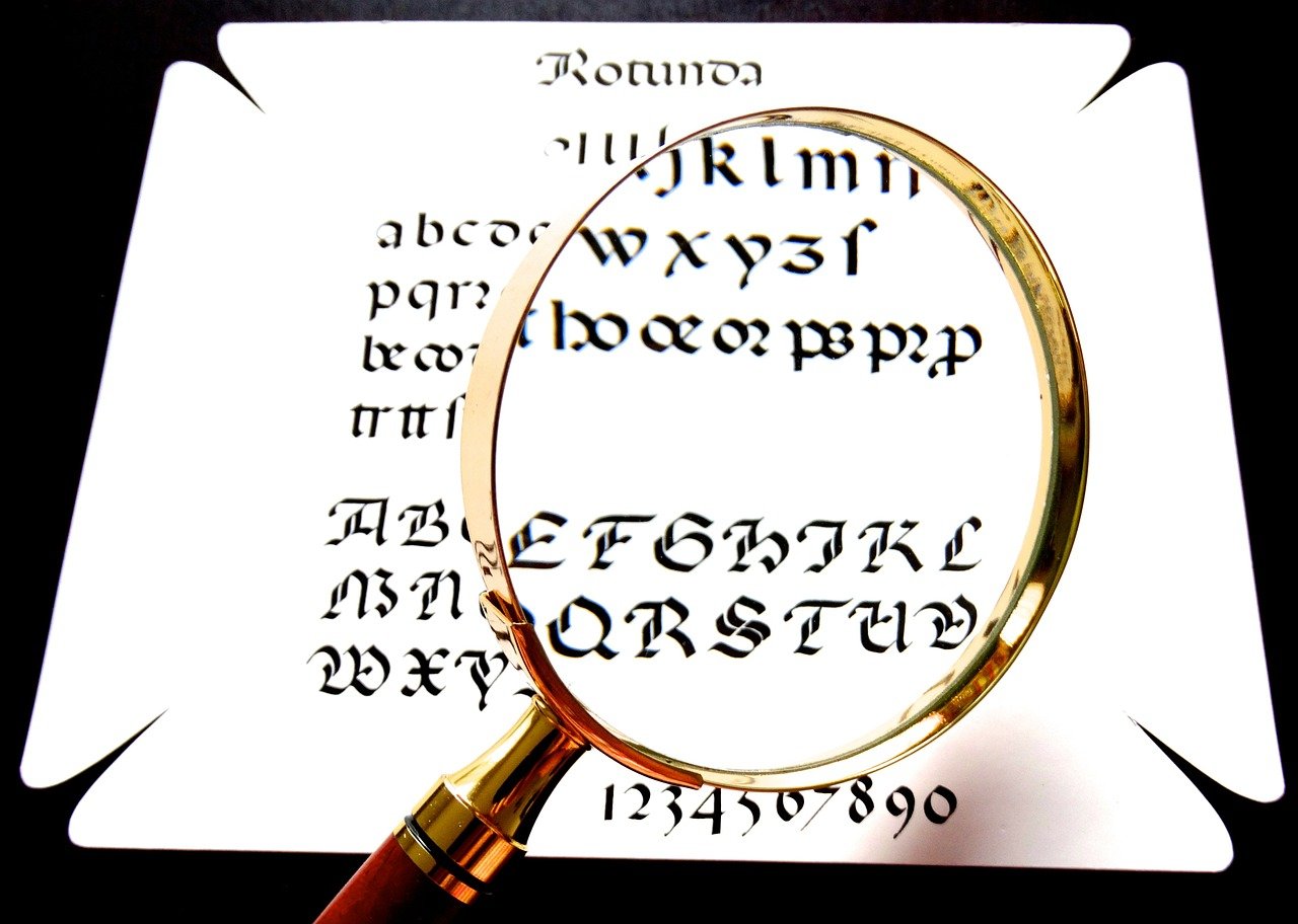 magnifying glass, calligraphy, enlarge, see better, greater, sharper, readable, reading aid, focus, writing, paper, text