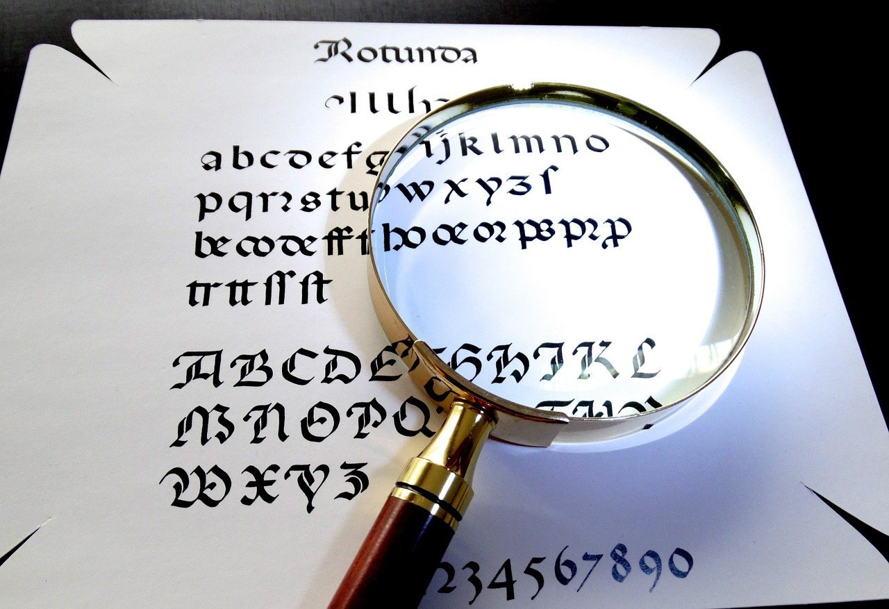 magnifying glass, calligraphy, enlarge, see better, greater, sharper, readable, reading aid, focus, writing, paper, text