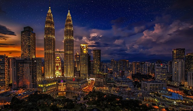 Kuala lumpur petronas twin towers cityscape city lights skyscrapers skyline buildings urban urban landscape metro twins malaysia sky bridge architecture modern city night night sky
