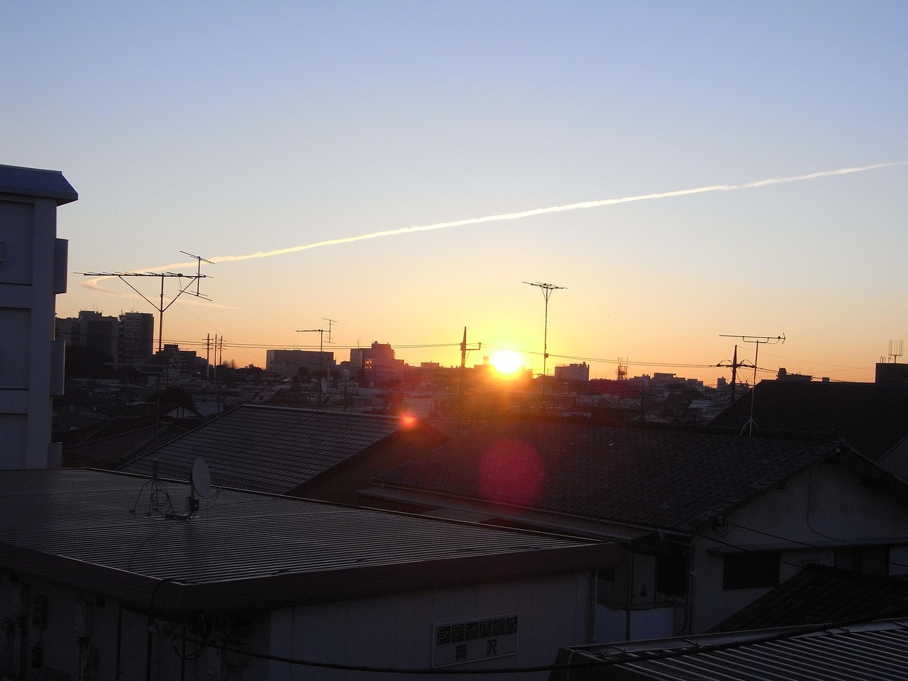 first sunrise, contrail, winter morning