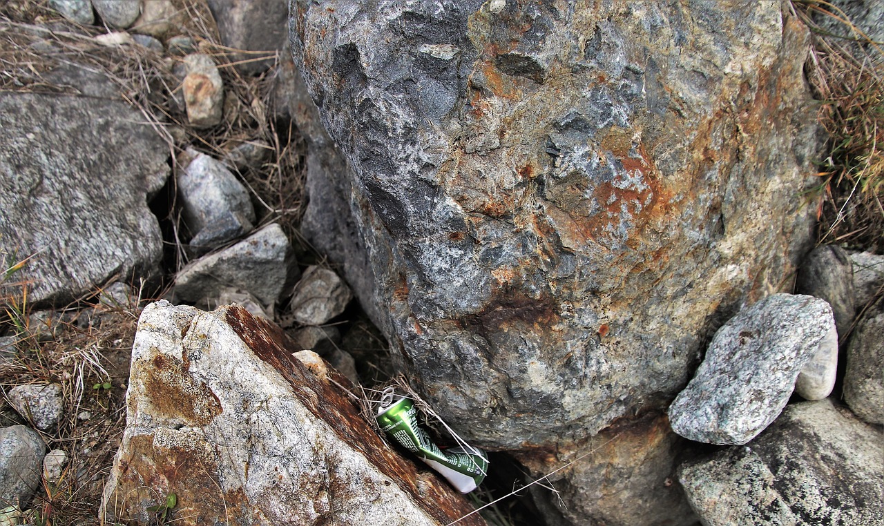 rocks, garbage, waste, the alps, contaminate, ecology, sad, nature, recycling, mountains, reject, packaging, to collect, the environment, pollution, metallic, processing, abandoned, dirty, throw, coca cola, stone, the destruction of the, casually, tin, reckless