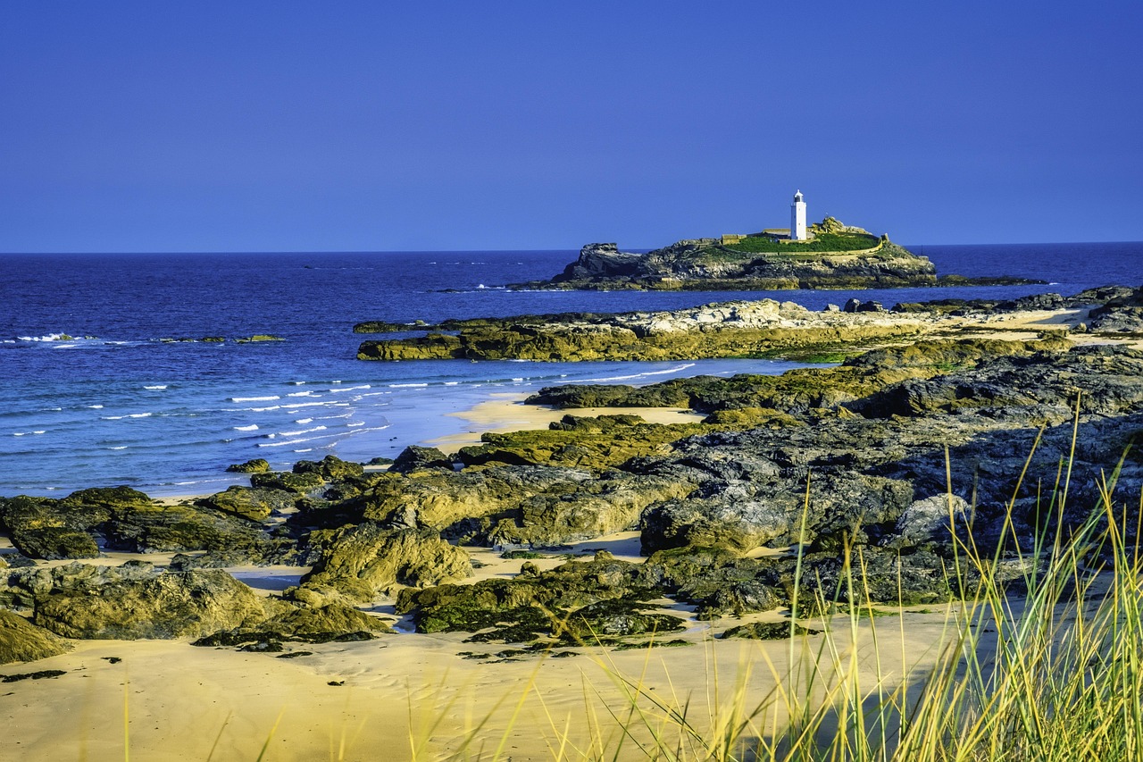 godrevy lighthouse, st ives bay, gwithian, cornwall, seascape, summer, rocks, tide, landmark, coast, island, sunny, blue, beach, nature, travel, landscape, vacation, holiday, relax, sun, sky, shore, blue sky, wave, resort, blue travel, blue sun, blue relax, blue summer, blue rock, blue wave, blue island, blue waves