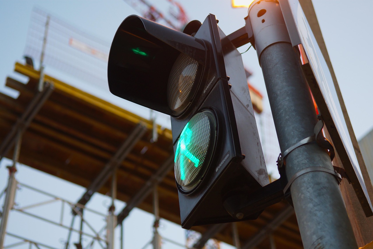 traffic light, the green light, walking, street, traffic signal, zebra crossing, city, building, building and construction, construction, traffic light, traffic light, traffic light, zebra crossing, zebra crossing, zebra crossing, zebra crossing, zebra crossing