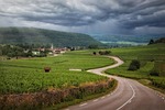 Road vineyards clouds burgundy france landscape